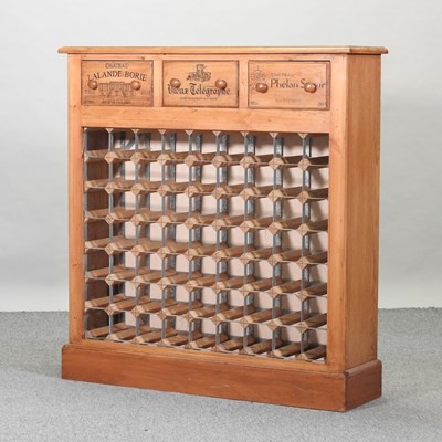 Lot 438 - A bespoke made light oak wine rack