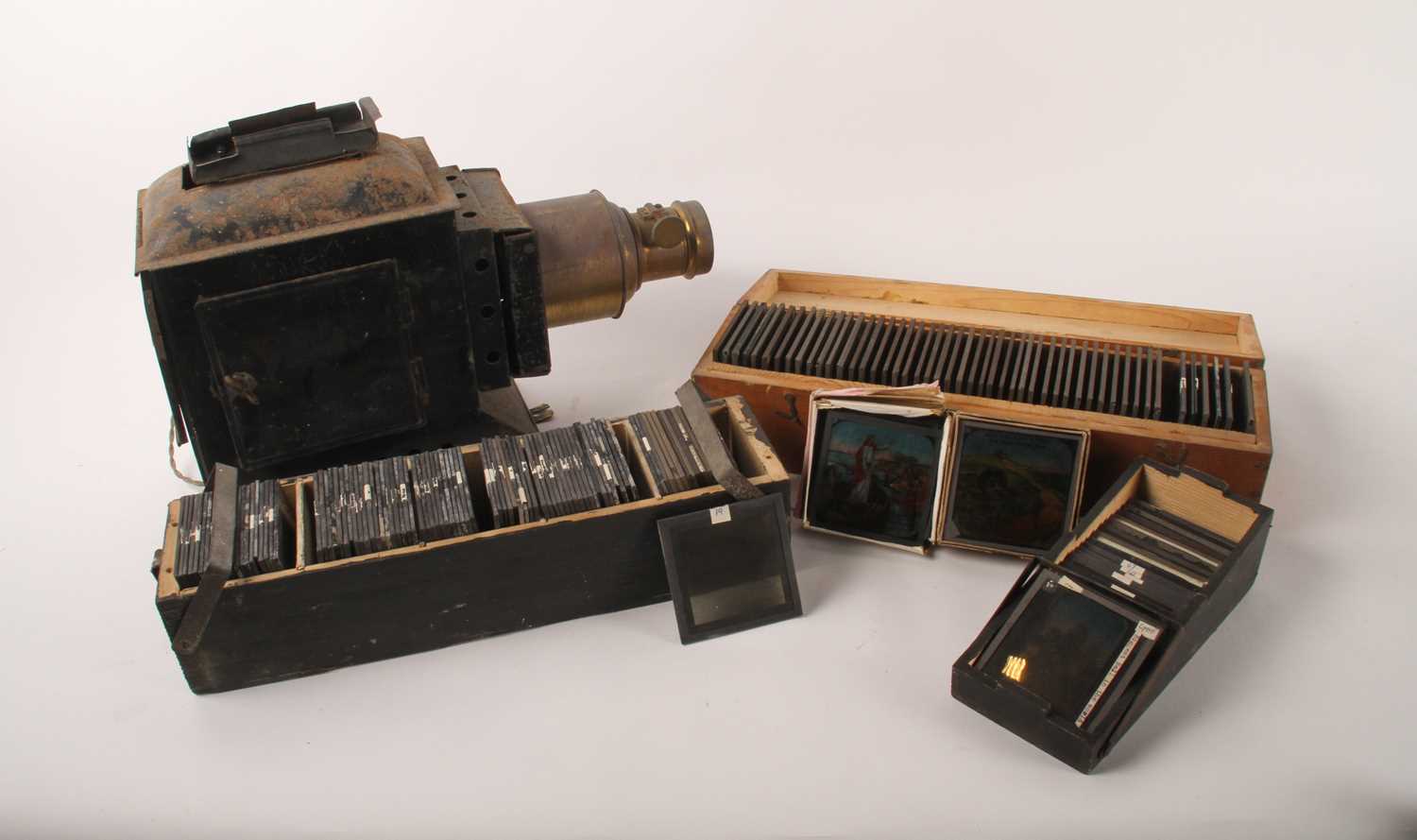 Lot 315 - A vintage magic lantern projector and slides