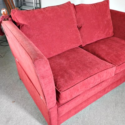 Lot 396 - A modern red upholstered knowle sofa