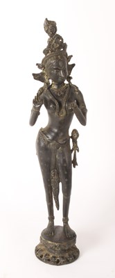 Lot 275 - An Asian bronze figure of a Buddhist goddess...
