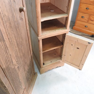 Lot 123 - A pine cabinet, 54cm wide, together with a...