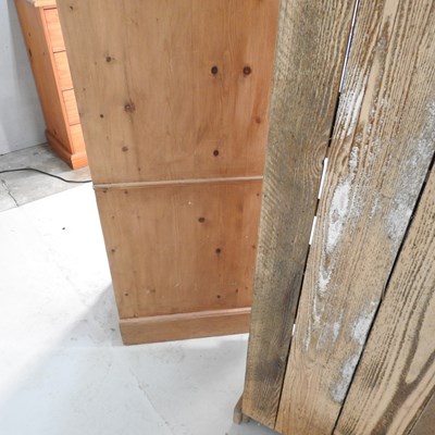 Lot 123 - A pine cabinet, 54cm wide, together with a...