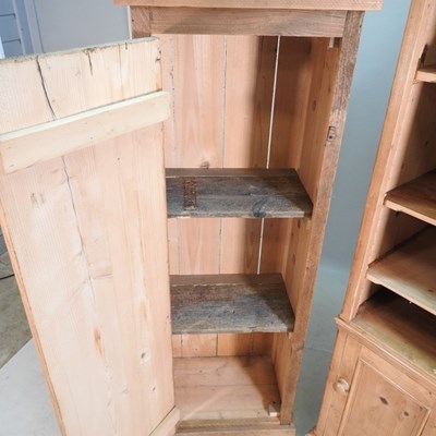 Lot 123 - A pine cabinet, 54cm wide, together with a...