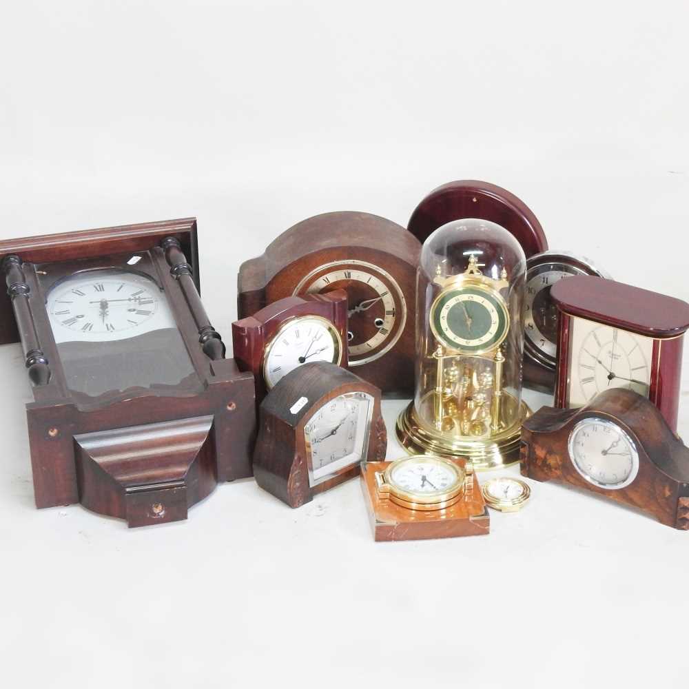Lot 337 - An anniversary clock, under a glass dome,...