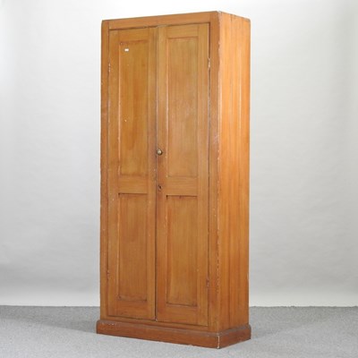 Lot 439 - An early 20th century grained pine school cabinet