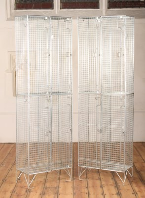 Lot 424 - A pair of steel four-door cage lockers