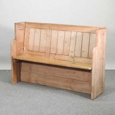 Lot 446 - An antique pine pew