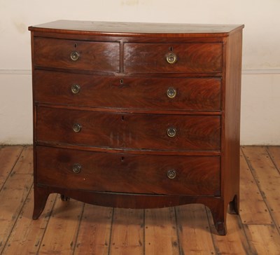 Lot 392 - A 19th century mahogany bow front chest of two...