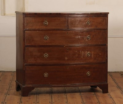 Lot 385 - A 19th century mahogany bow front chest of two...