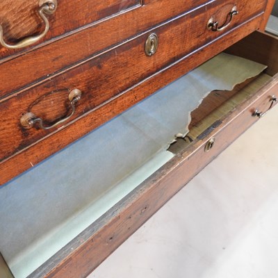 Lot 517 - An 18th century oak mule chest, the hinged lid...