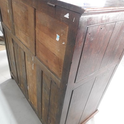 Lot 517 - An 18th century oak mule chest, the hinged lid...