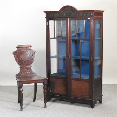 Lot 596 - An Edwardian glazed display cabinet