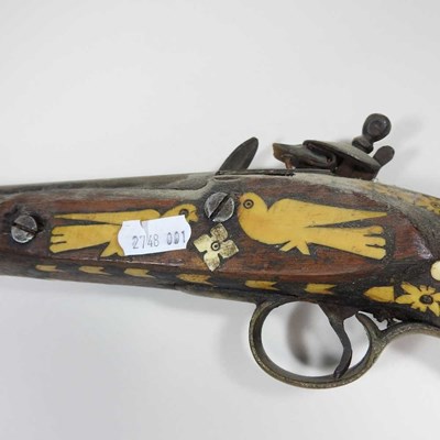 Lot 495 - A middle Eastern flintlock pistol, with bone...