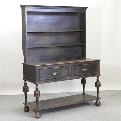 Lot 507 - An early 20th century oak dresser