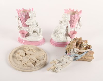 Lot 311 - A Berlin porcelain figural wall pocket in the...