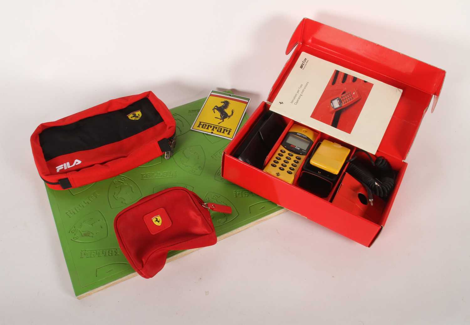 Lot 308 - A Ferrari F10 edition Hagenuk mobile phone, in...