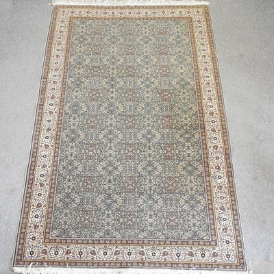 Lot 606 - A Turkish rug