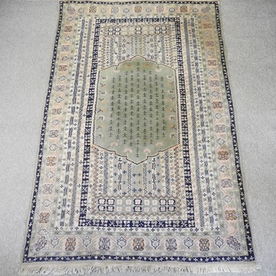 Lot 608 - A Persian woollen prayer rug