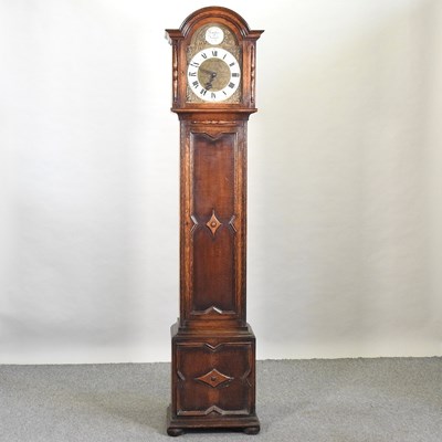 Lot 609 - A 1920's oak cased longcase clock