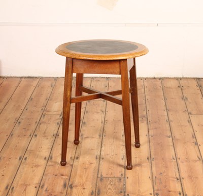 Lot 437 - A mahogany circular pub table, having an inset...