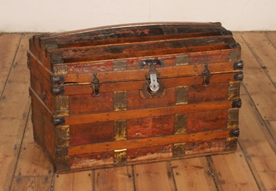 Lot 373 - A 19th century wooden bound dome top trunk