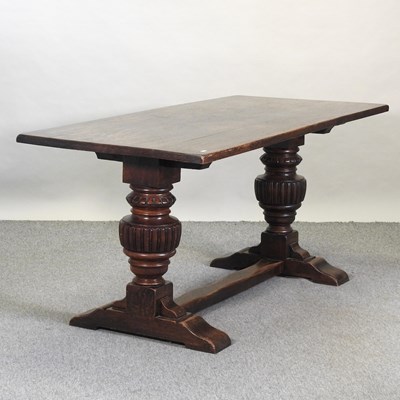 Lot 600 - An early 20th century oak refectory dining table