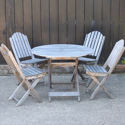 Lot 342 - A teak garden table