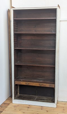 Lot 569 - A white painted standing open bookcase, with...