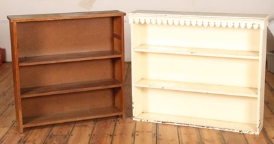 Lot 447 - A white painted open bookcase, together with...