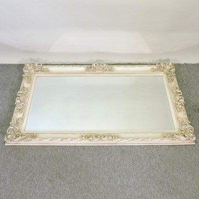 Lot 454 - A modern cream painted wall mirror