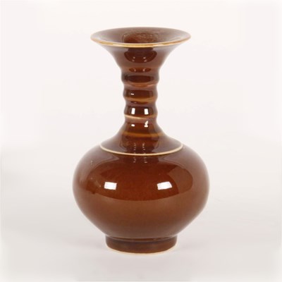 Lot 307 - A Chinese brown glazed porcelain vase, having...