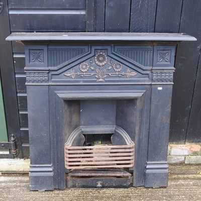 Lot 356 - An antique painted cast iron fire insert