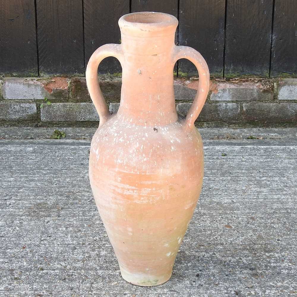 Lot 352 - A terracotta amphora garden vase