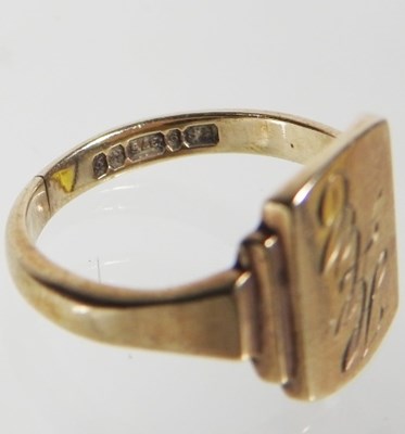 Lot 99 - A 9 carat gold signet ring, engraved with...