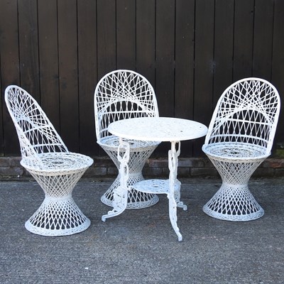 Lot 354 - A white painted patio set