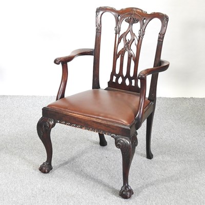 Lot 568 - A George III style mahogany elbow chair