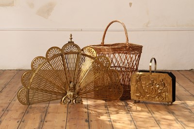 Lot 547 - An early 20th century brass folding peacock...