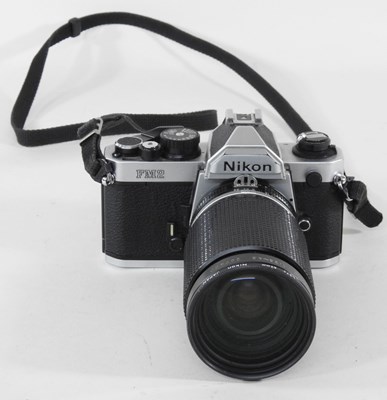 Lot 90 - A Nikon FM 2 camera, with a 35-135mm lens, cased