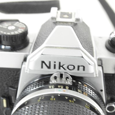 Lot 90 - A Nikon FM 2 camera, with a 35-135mm lens, cased