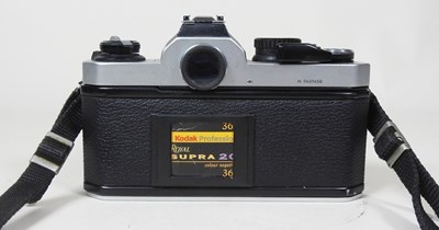 Lot 90 - A Nikon FM 2 camera, with a 35-135mm lens, cased