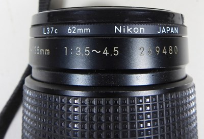 Lot 90 - A Nikon FM 2 camera, with a 35-135mm lens, cased