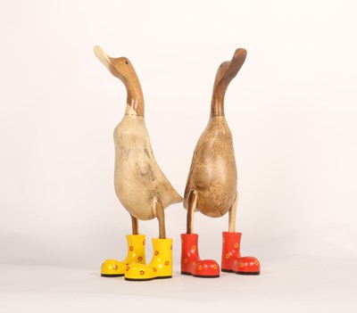 Lot 420 - A pair of wooden models of ducks, one wearing...