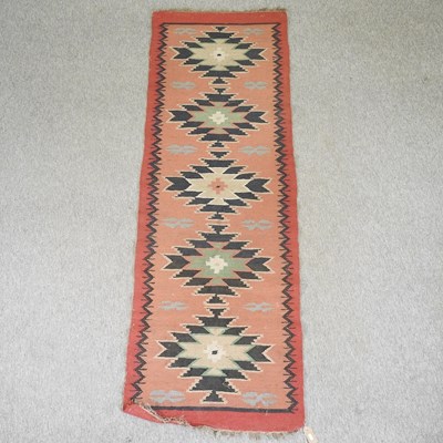 Lot 226 - A kelim runner