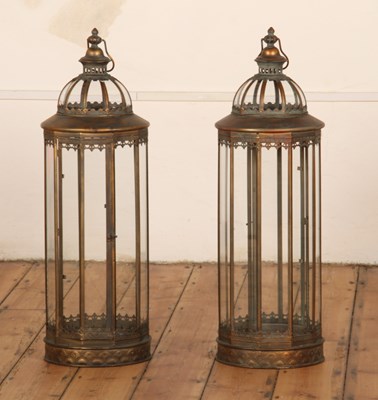 Lot 376 - A pair of large bronzed lanterns, with glazed...
