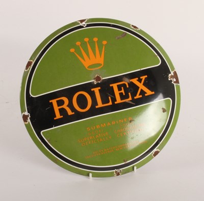 Lot 451 - A convex circular enamel sign