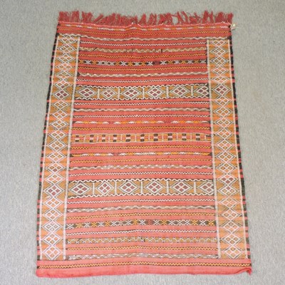 Lot 235 - A kelim rug