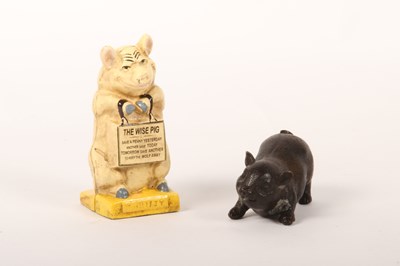 Lot 392 - A painted cast iron The Wise Pig money box,...