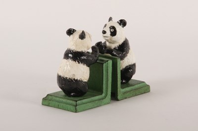 Lot 421 - A pair of painted cast metal novelty bookends,...