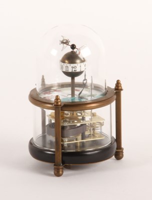 Lot 379 - A clockwork automaton clock, decorated with...