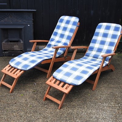 Lot 326 - A pair of teak folding garden steamer chairs